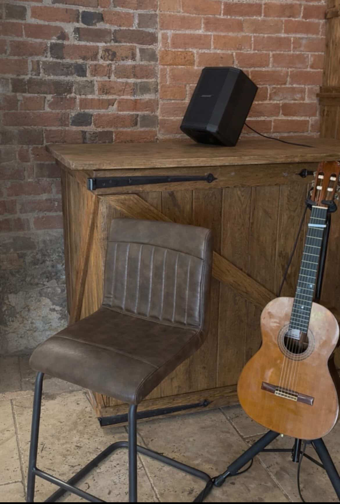 Stuart Toogood's guitar and Bose speaker set up at Curradine Barns